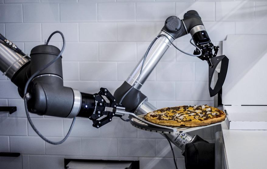 Robot capable de fabriquer de manière autonome des pizzas Robot capable de fabriquer de manière autonome des pizzas